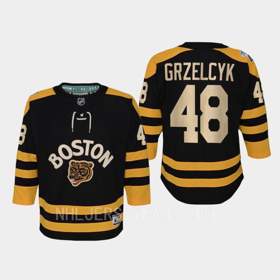 youth bruins matt grzelcyk black 2023 winter classic premier jersey